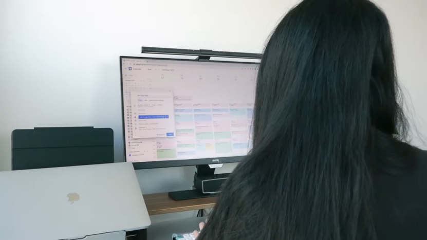 A person is creating a study schedule on Google Calendar using a computer