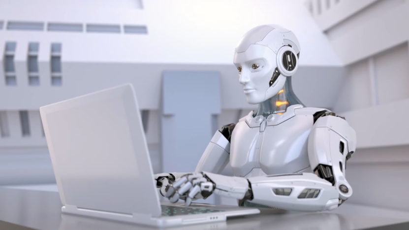 A Robot Using a Laptop, Representing the Future of AI in Education